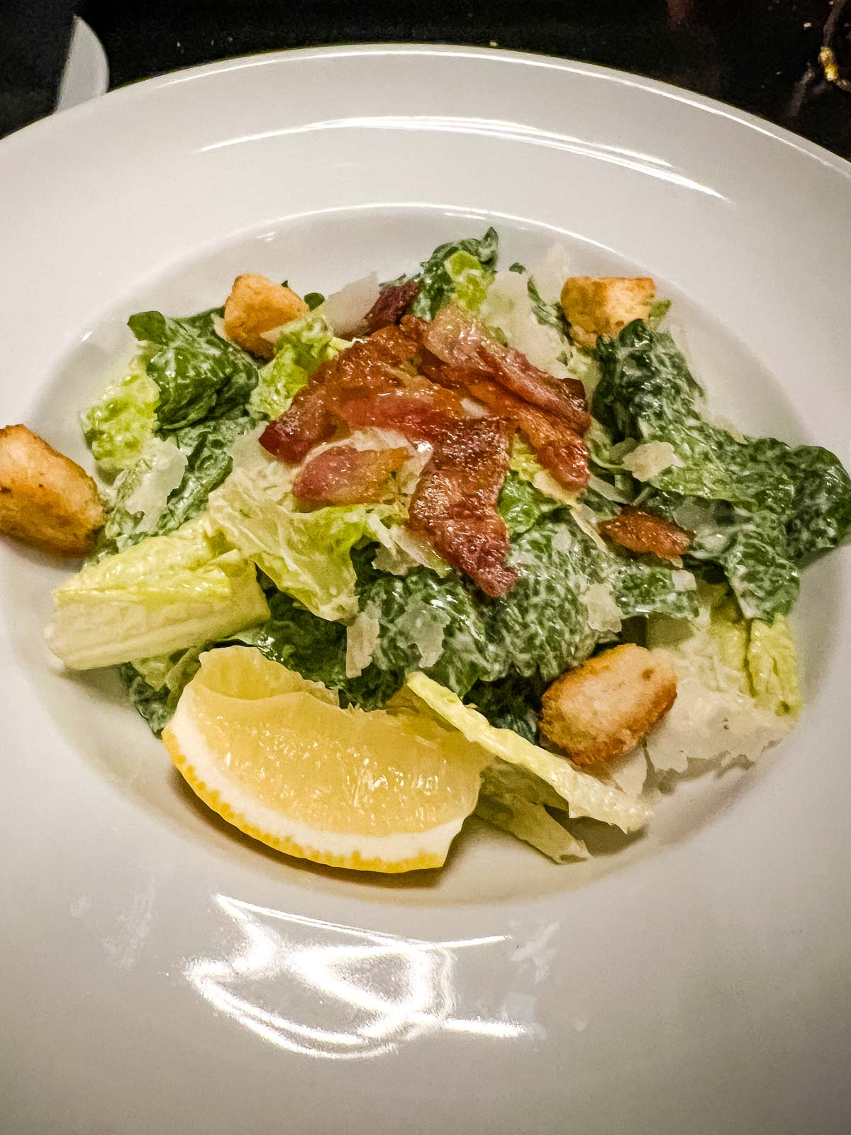 Caesar salad on a plate.