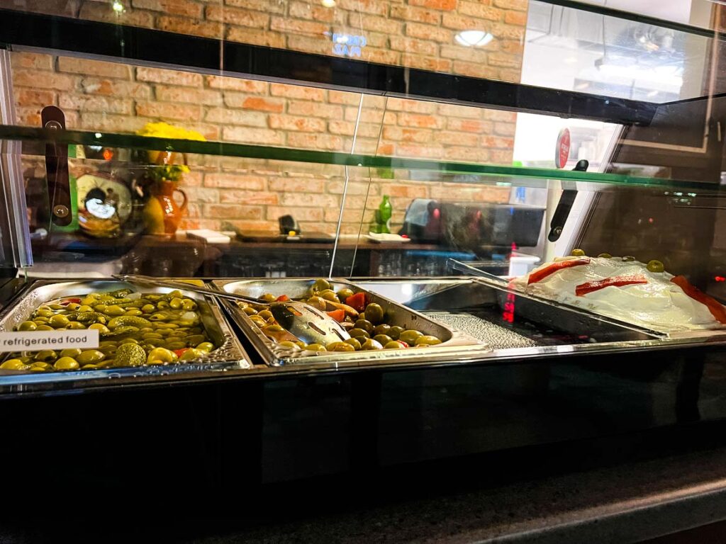 Selection of cold tapas in a display case.