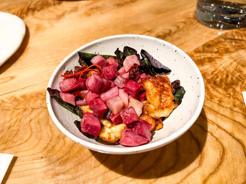 Snack of roasted radish and halloumi cheese.