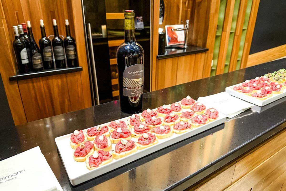 Photo of a displayed wine and dish from Konzelmann Estate Winery at Niagara on the Lake.