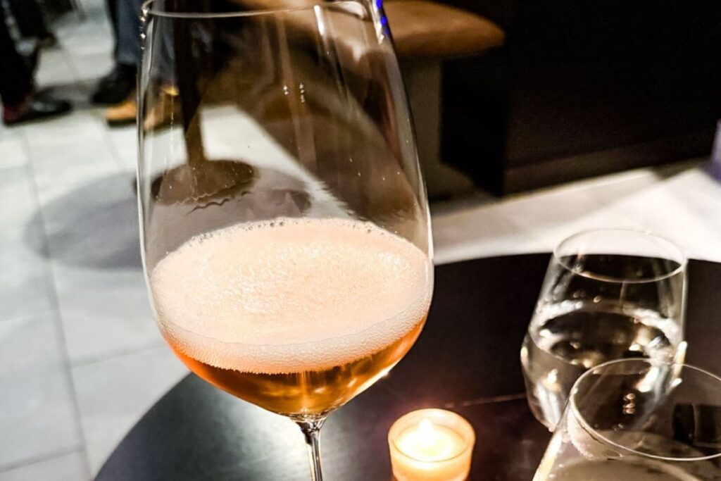Photo of a glass of wine in Aulis London.