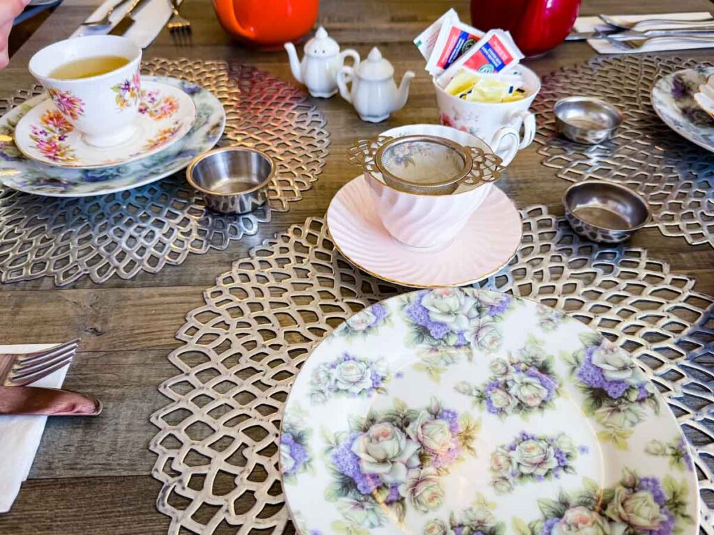 Plates and table presentation in Maddie Hatter Tea Shop.