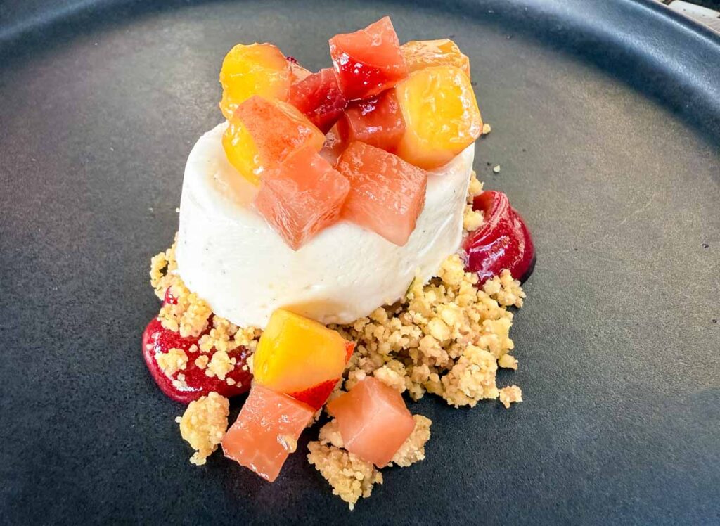 A dessert with fruits as toppings.
